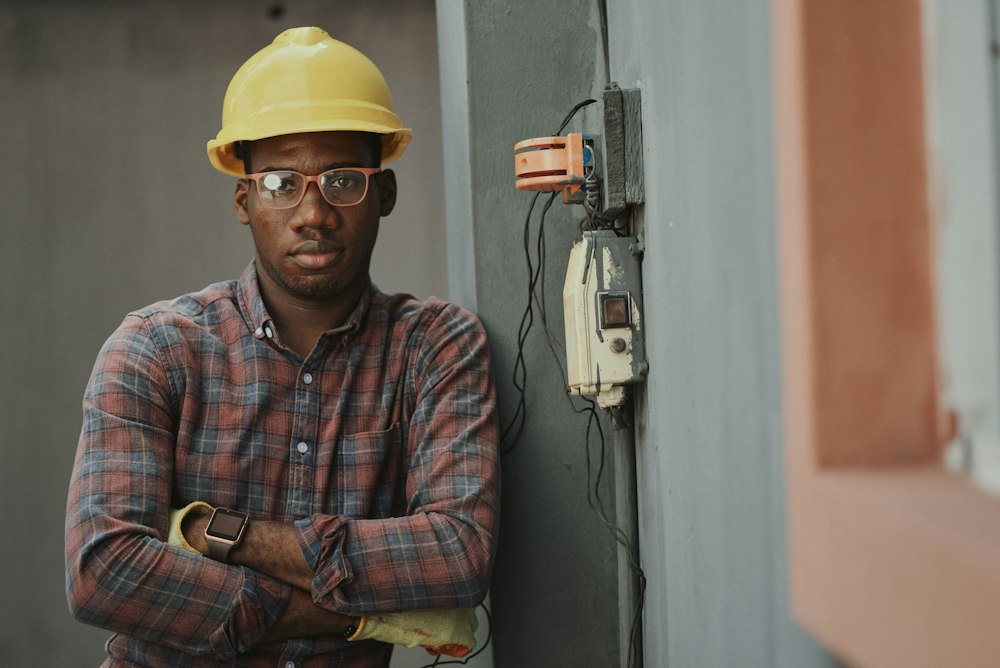 Comfort Air Solutions technician inspecting air conditioning equipment